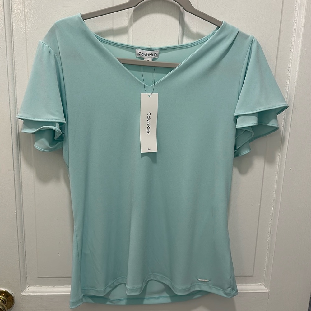 Mint green Calvin Klein flutter sleeve blouse. NWT